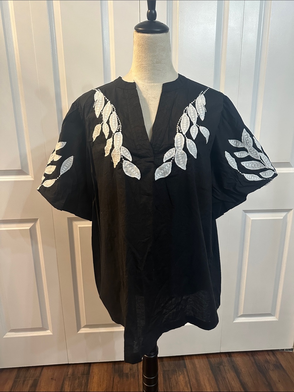 New with the tags black and white top